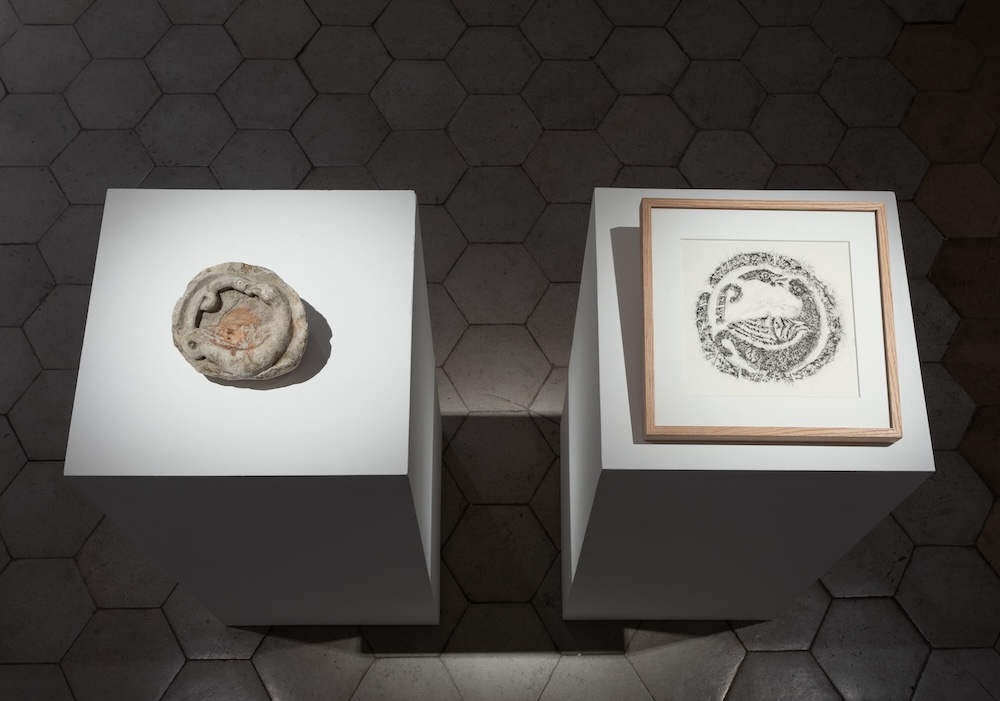 An antique object at left and a print of the same at right