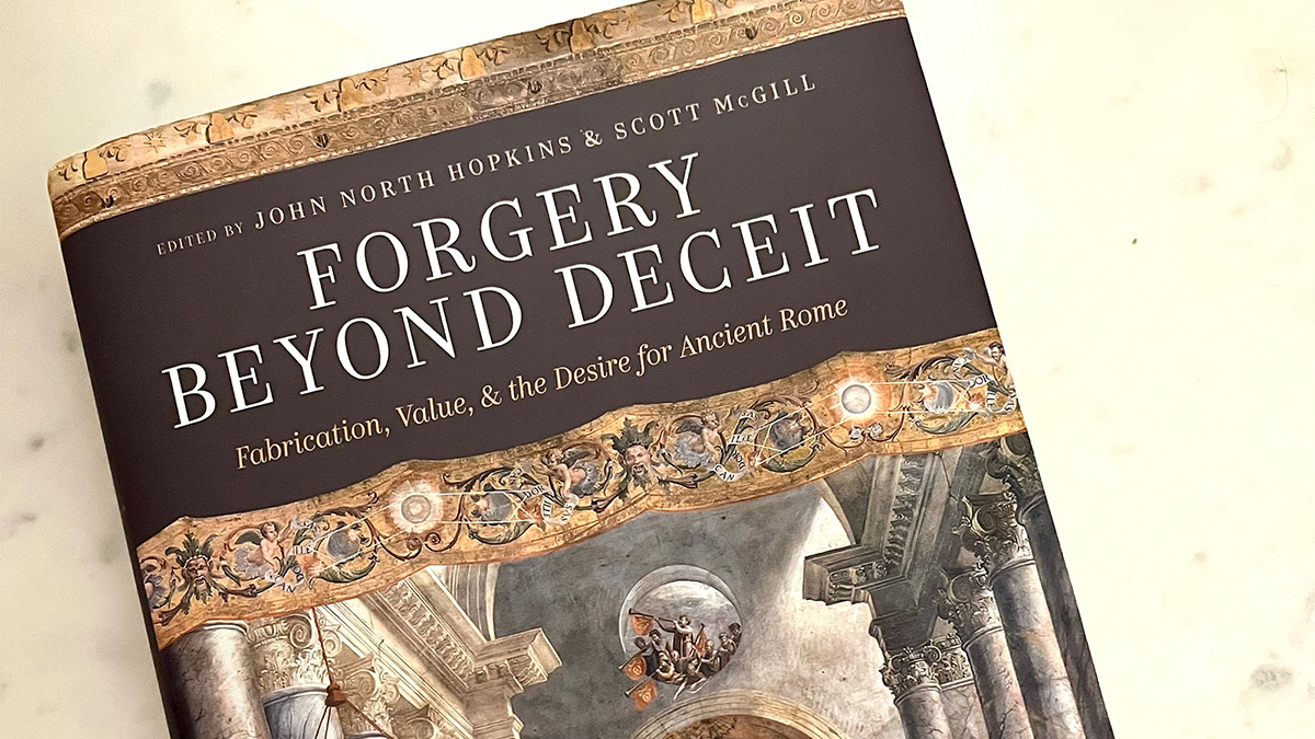 Color photograph of a book cover showing the title and editors names and tilted slightly to the left