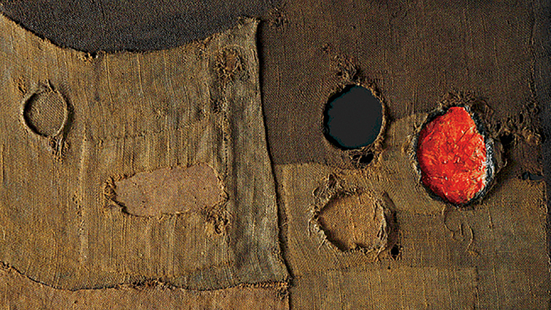 Detail of a 1953 painting by Alberto Burri made of burlap sacking, oil paint, and Vinavil on canvas