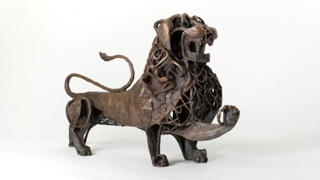 A bronze sculpture of a lion